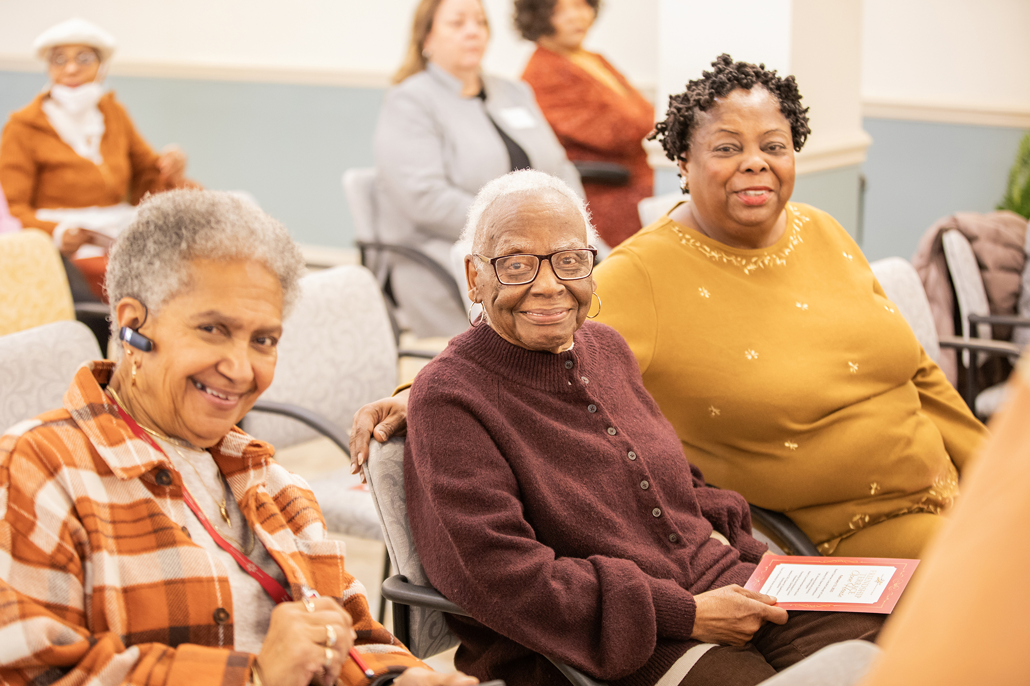 Friendship Terrace senior residents and guests gather during the Open House celebrating the community’s renovations and affordable housing preservation.