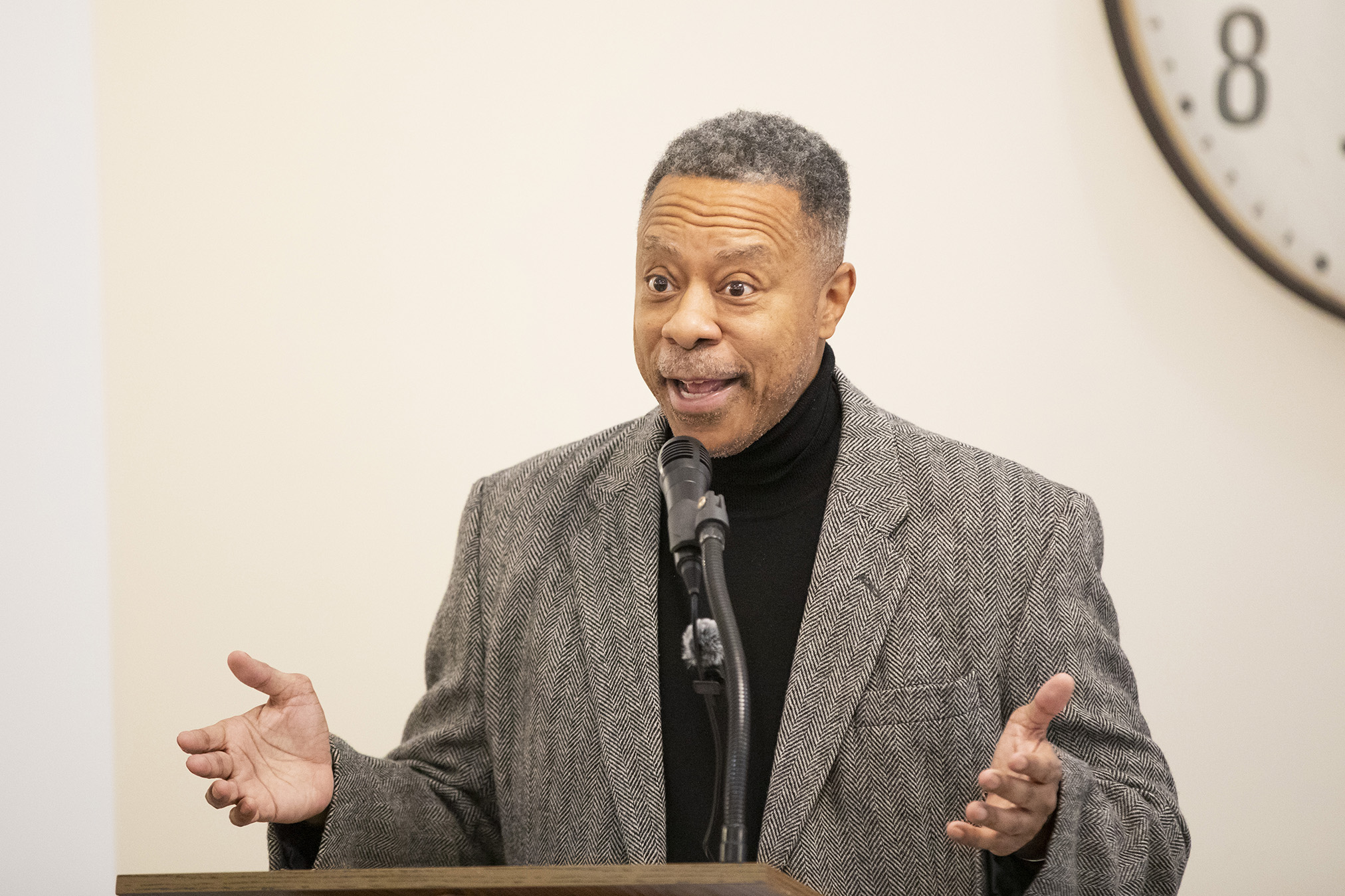 DCHA Executive Director Keith Pettigrew speaks to guests during the Friendship Terrace Open House.