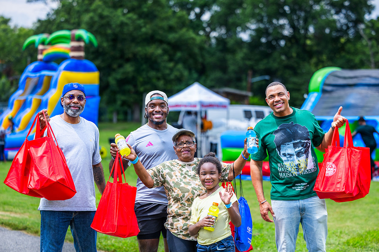 Approximately 250 residents, families and friends from the neighborhood enjoyed bounce houses, a water slide, foam bubbles, various games, face painting, food, live music and more. Children in attendance were thrilled to see Woody from the Toy Story movies at the party. Attendees were able to connect and enjoy the day together, further strengthening community bonds.