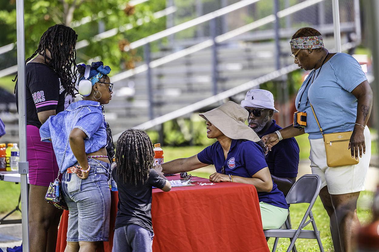Approximately 250 residents, families and friends from the neighborhood enjoyed bounce houses, a water slide, foam bubbles, various games, face painting, food, live music and more. Children in attendance were thrilled to see Woody from the Toy Story movies at the party. Attendees were able to connect and enjoy the day together, further strengthening community bonds.