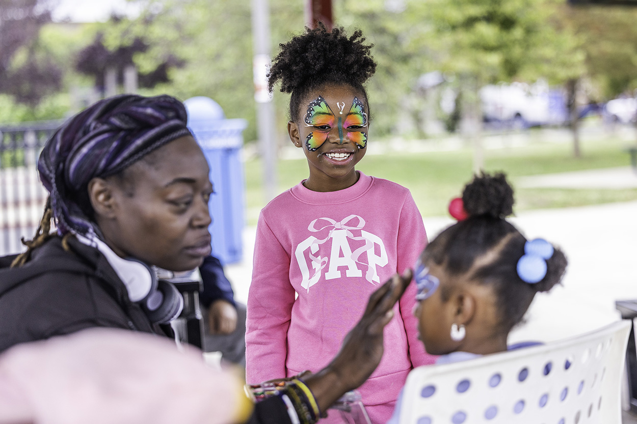 More than 170 people braved the rain to join DCHA staff for a fun-filled day with their family, friends and neighbors. Partygoers enjoyed food, live music, games, face painting, bounce houses and more. The block party also allowed people to connect and strengthen community bonds. 