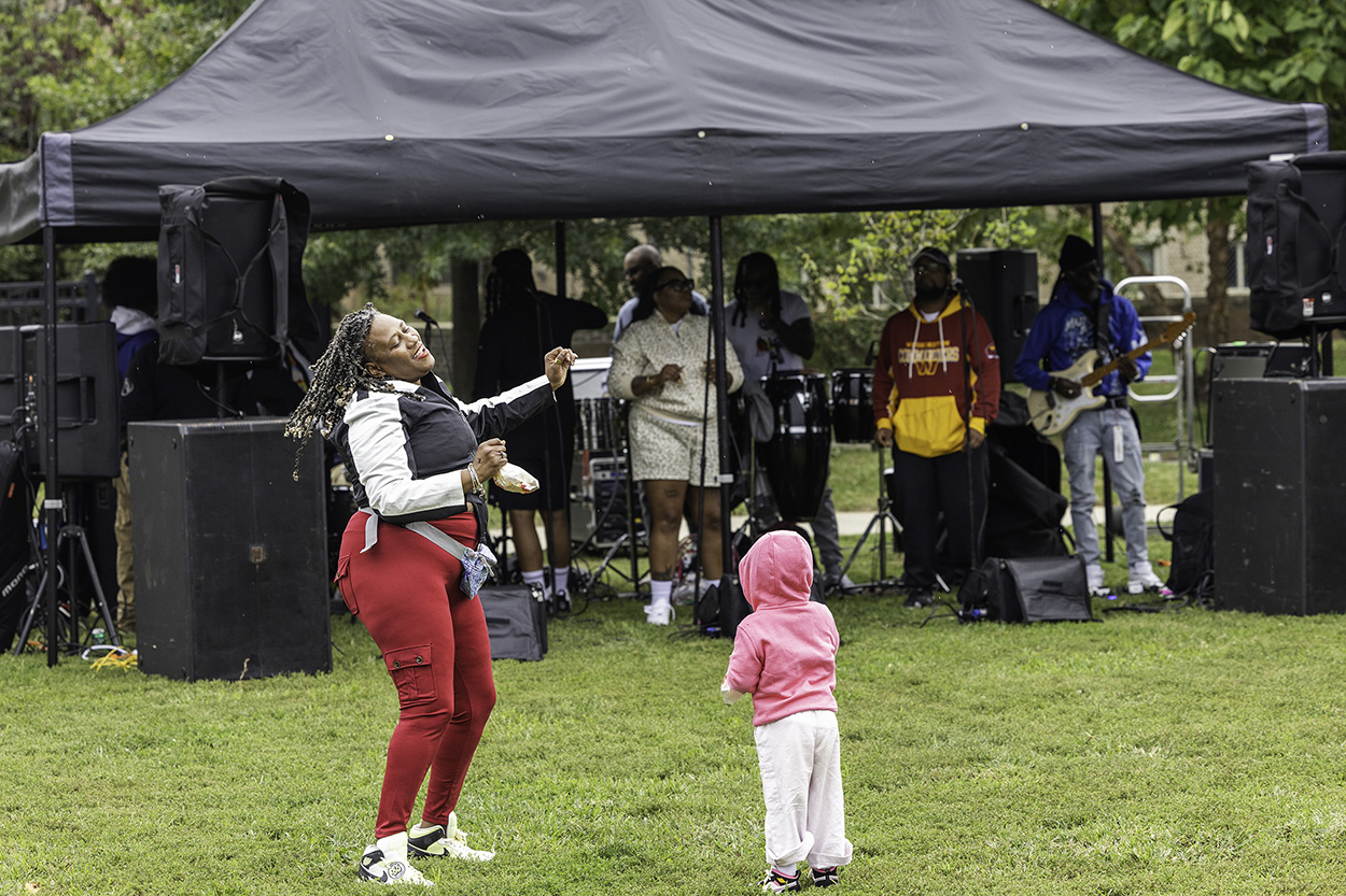 More than 170 people braved the rain to join DCHA staff for a fun-filled day with their family, friends and neighbors. Partygoers enjoyed food, live music, games, face painting, bounce houses and more. The block party also allowed people to connect and strengthen community bonds. 