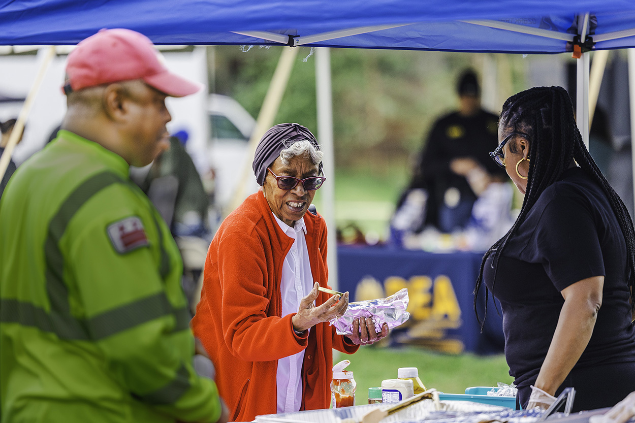 More than 170 people braved the rain to join DCHA staff for a fun-filled day with their family, friends and neighbors. Partygoers enjoyed food, live music, games, face painting, bounce houses and more. The block party also allowed people to connect and strengthen community bonds. 