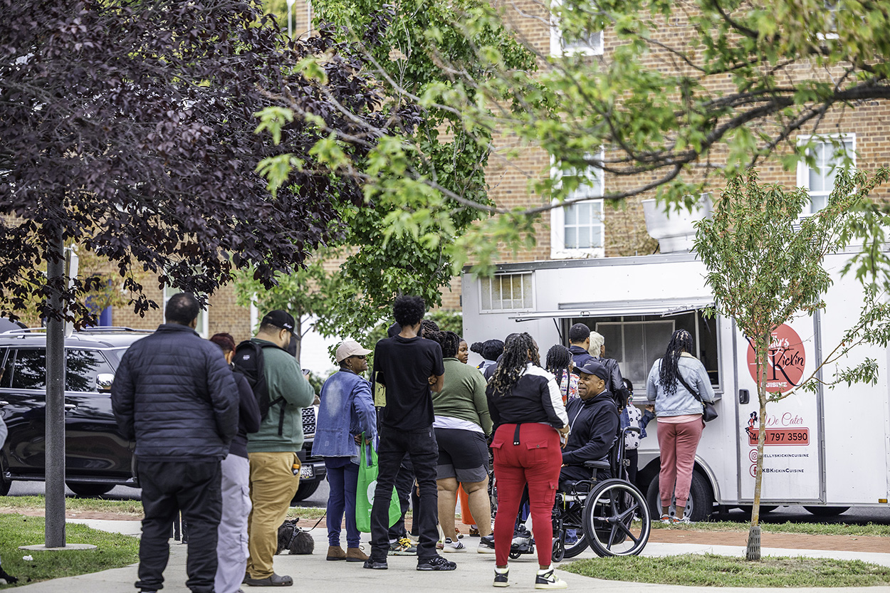 More than 170 people braved the rain to join DCHA staff for a fun-filled day with their family, friends and neighbors. Partygoers enjoyed food, live music, games, face painting, bounce houses and more. The block party also allowed people to connect and strengthen community bonds. 