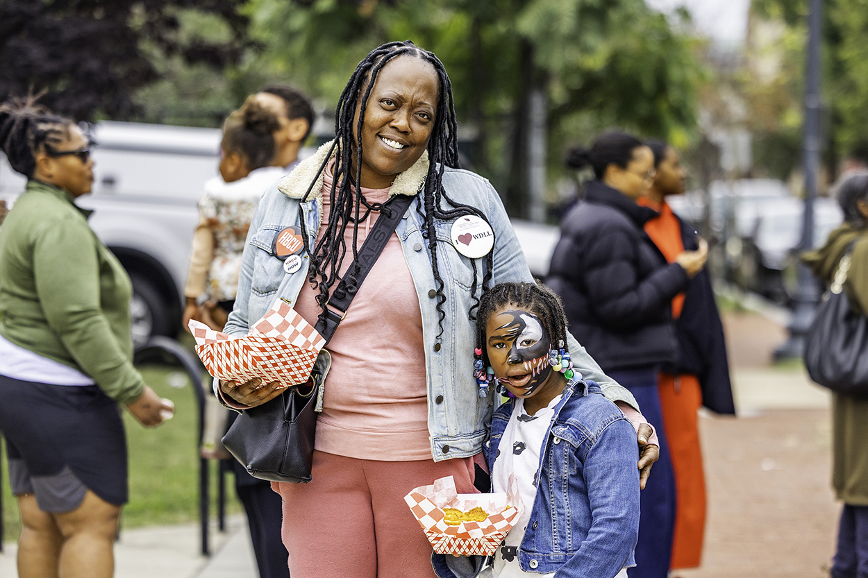 More than 170 people braved the rain to join DCHA staff for a fun-filled day with their family, friends and neighbors. Partygoers enjoyed food, live music, games, face painting, bounce houses and more. The block party also allowed people to connect and strengthen community bonds. 